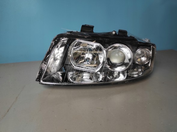 TYC 8E0941004 8E0941030C Лампа передня ліва audi a4 b6 h7+h7+py21w+w5w