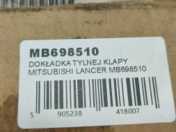 Mitsubishi OE НАКЛАДКА ЗАДНЬОГО ЛЮКА MITSUBISHI LANCER VAN 1989-1992 НОВА ORYG MB698510