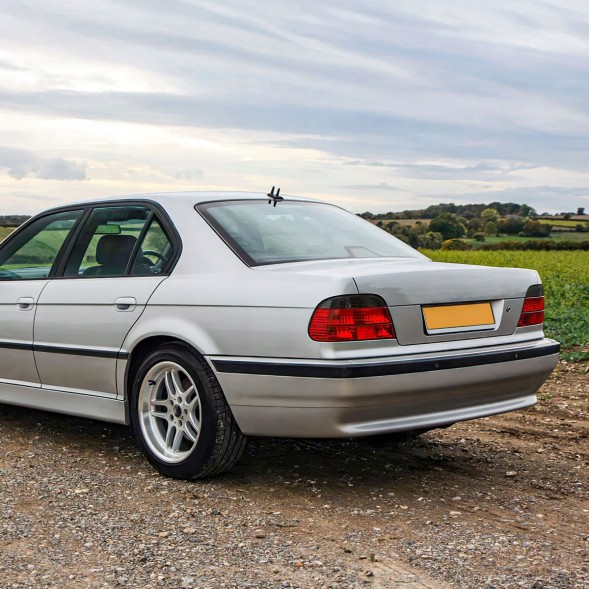 Китай FPLTBM45 Ліхтарі задні BMW 7 E38 1994-2001 червоні-димчасті задні, димчасті, ліфт малюнок LCI