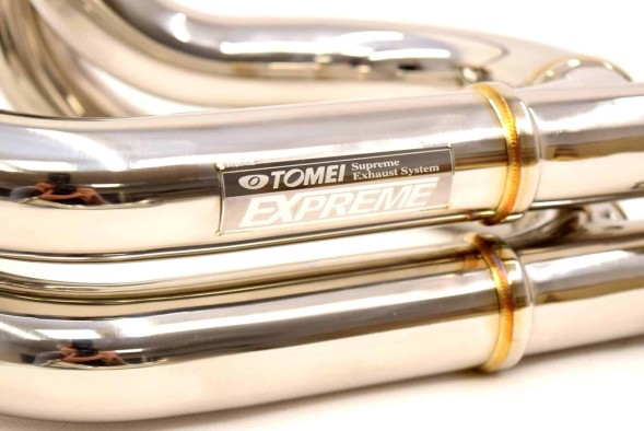 Китай 414001 Випускний колектор з аппайпом twinscroll Tomei Subaru Impreza STI