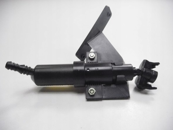 Ford OE 1346677 Форсунка омийника фар - права сторона ford mondeo oe 1346677