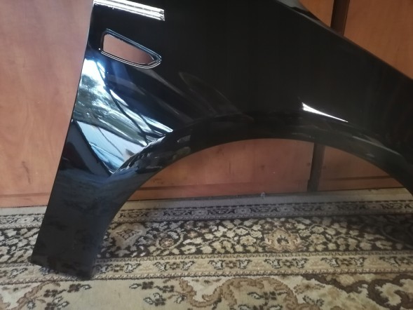 Китай 551102 Opel Astra 4 J IV правий срібний бризковик Z176