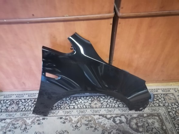 Китай 551102 Opel Astra 4 J IV правий срібний бризковик Z176