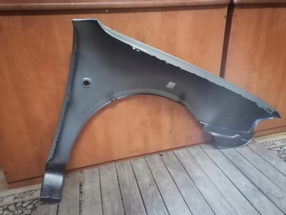 Tong Yang 231321 КРИЛО ПЕРЕДНЕ ЛІВЕ SKODA OCTAVIA I 9156